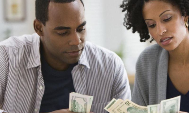 Couple counting money