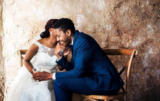 Black couple on their wedding day [iStock]