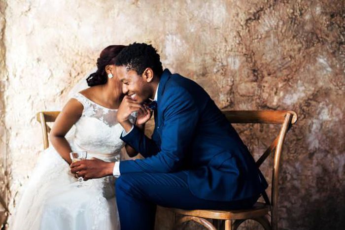 Black couple on their wedding day [iStock]