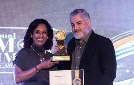 Ali Jihami- right receiving his award