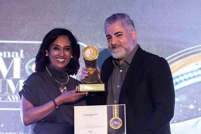 Ali Jihami- right receiving his award