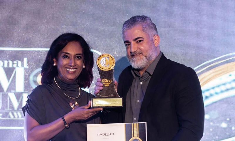 Ali Jihami- right receiving his award