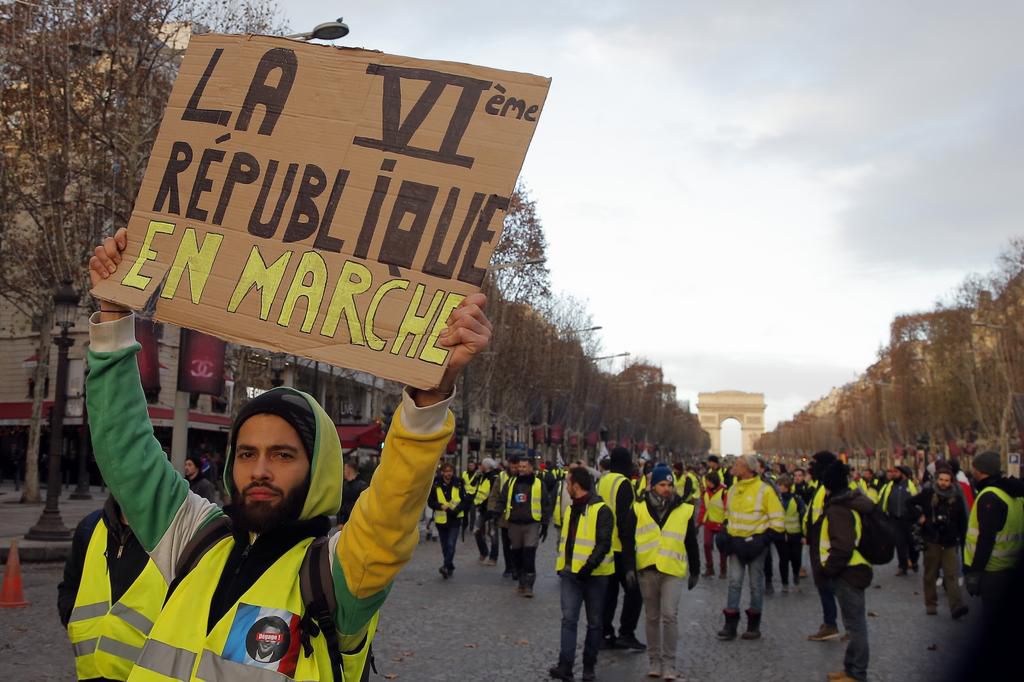 More than 1,300 were arrested and dozens injured after violent anti-government protests engulfed France — here's how the clashes unfolded
