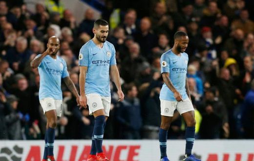 Manchester City's Raheem Sterling (right) was the victim of alleged racist abuse by a Chelsea fan on Saturday