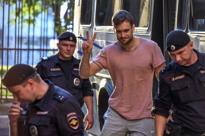 Pussy Riot punk band member Pyotr Verzilov (C) has regained consciousness after being hospitalised in Moscow with suspected poisoning