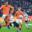 Netherlands' captain Virgil van Dijk (L) equalised in the 91st minute to grab a point in Monday's 2-2 draw against Germany, which was enough to put the Dutch into the Nations League semi-finals at the expense of world champions France.
