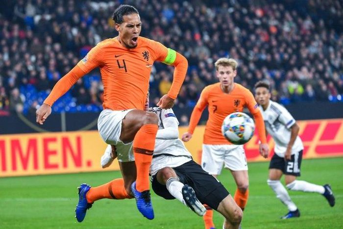 Netherlands' captain Virgil van Dijk (L) equalised in the 91st minute to grab a point in Monday's 2-2 draw against Germany, which was enough to put the Dutch into the Nations League semi-finals at the expense of world champions France.