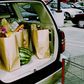 Groceries in back of car, parked in parking lot (Cross Processed)