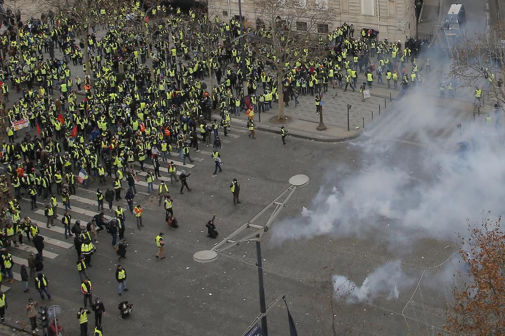 More than 1,300 were arrested and dozens injured after violent anti-government protests engulfed France — here's how the clashes unfolded