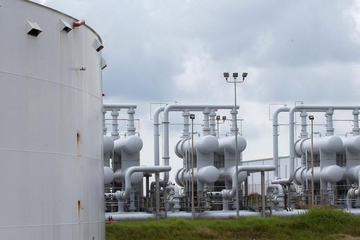 FILE PHOTO: An oil storage tank and crude oil pipeline equipment is seen during a tour by the Department of Energy at the Strategic Petroleum Reserve in FreeportReuters