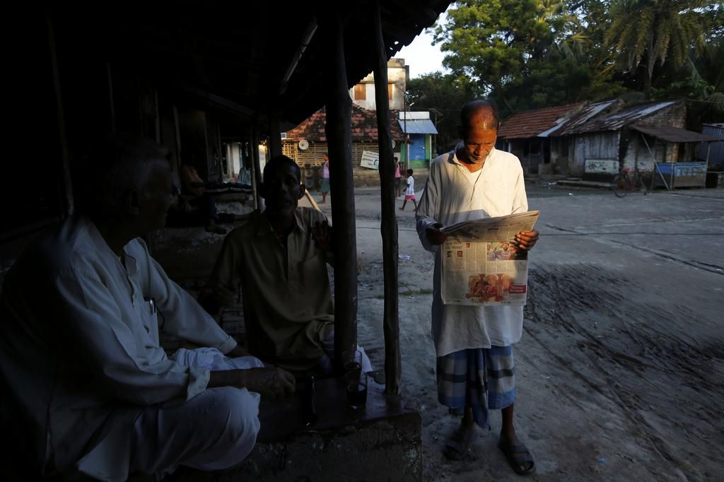 An island in India is disappearing, but some of the last residents say they can't afford to move away