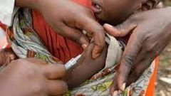 Child being vaccinated