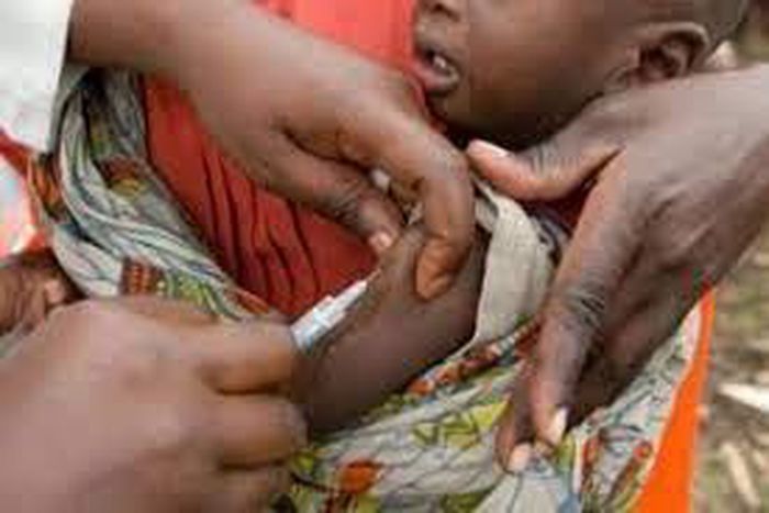 Child being vaccinated