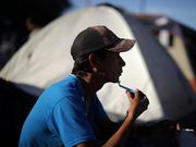Powerful photos and stories from the caravan show migrants' harrowing journey to the US
