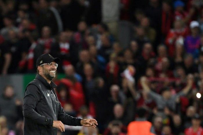 Liverpool manager Jurgen Klopp celebrates after beating Paris Saint-Germain 3-2 on Tuesday