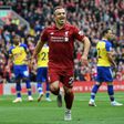 Swiss bliss: Xherdan Shaqiri celebrates after Southampton defender Wesley Hoedt scores an own goal