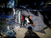 Powerful photos and stories from the caravan show migrants' harrowing journey to the US