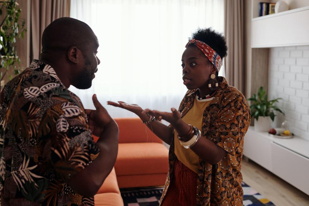 Man and woman having an argument (Photo by Diva Plavalaguna)
