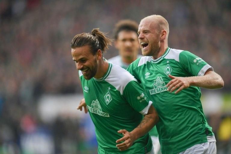 Austrian forward Martin Harnik (L) and Bremen's Dutch midfielder Davy Klaassen (R) have been at the heart of Werder Bremen's impressive start to the season as one of only three teams still unbeaten in Germany's top flight.