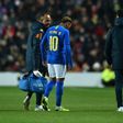 Neymar leaves the pitch injured during the international friendly between Brazil and Cameroon in Milton Keynes, central England