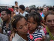 Powerful photos and stories from the caravan show migrants' harrowing journey to the US