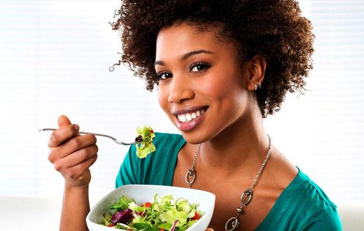 Woman eating vegetables(ebony)
