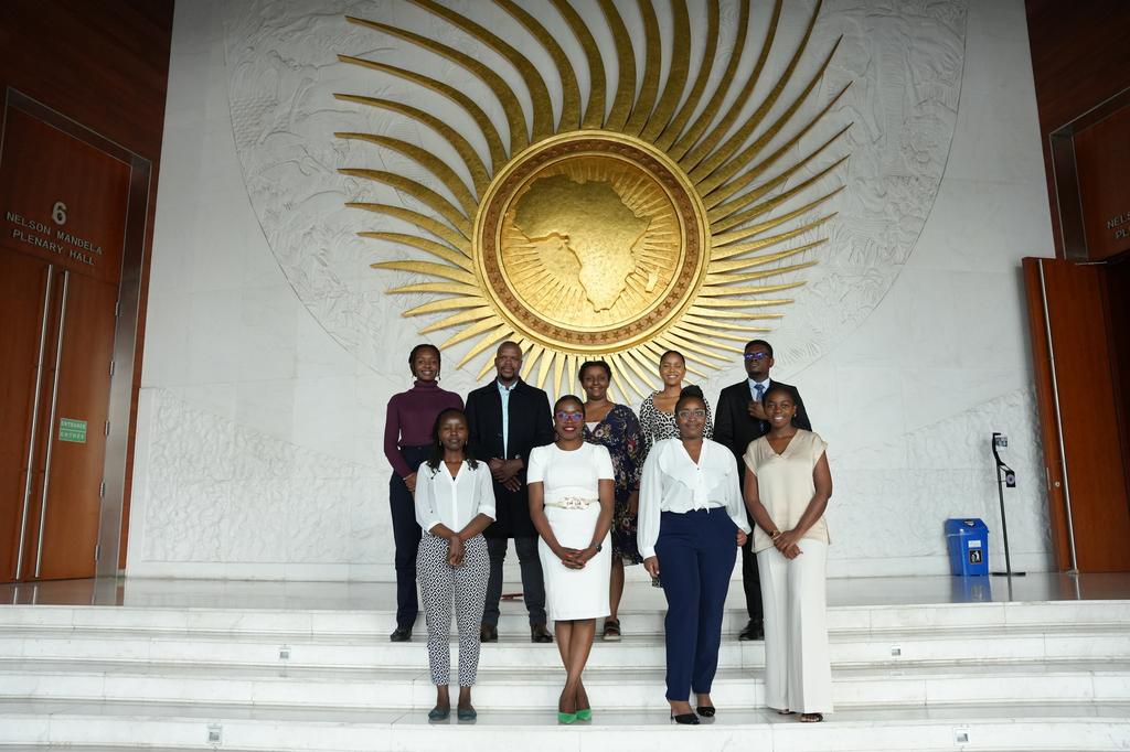 L-R Back: Lorretta Binu Kade, deployed to the African Union’s Youth for Peace Program, Tebalo Thatho, deployed to the Department of Information and Communications (DIC), Hana Erkou, deployed to the Office of the Director General, Batshidi Selebogo, deployed to the Office of the Deputy Chairperson, Obaloluwa Ajiboye, deployed to the Women, Gender, Youth Directorate.  L-R Front: Jelagat Mercy Kimosop, deployed to the Office of the Director General, Sabina Nforba, deployed to the Office of the Youth Envoy (OYE), Passy Miano, deployed to the Afri can Union Development Agency - NEPAD, and Esther Ndagire, deployed to the AUDA -NEPAD Coordination Unit)