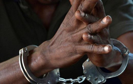 Handcuffed man