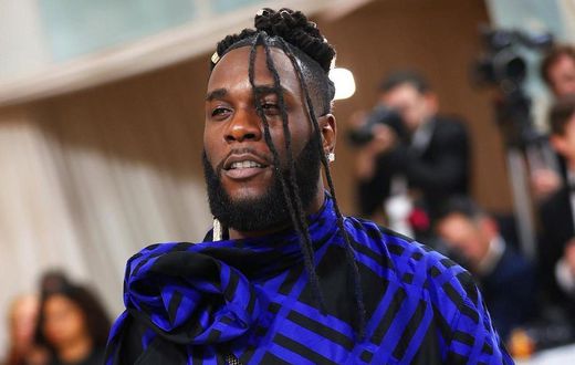 Burna Boy's outfit at the Met Gala has received praise from both fashion enthusiasts and fans, with many applauding his bold and stylish choice of attire.  [Yabaleftonline]