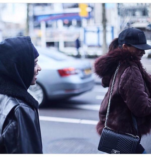 Wizkid and Jada Pollock share a laugh on the streets of London.