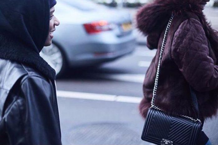 Wizkid and Jada Pollock share a laugh on the streets of London.