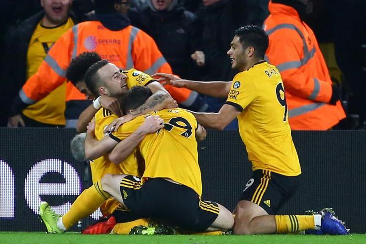 Wolves celebrate their winning goal against Chelsea