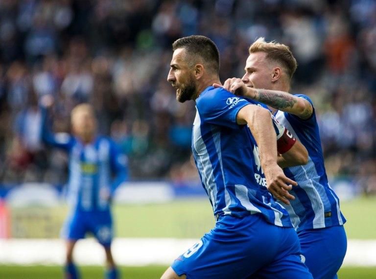 Hertha Berlin captain Vedad Ibisevic (C) scored twice in the 4-2 win over Borussia Moenchengladbach at the Olympic stadium to leave his side second in the table.