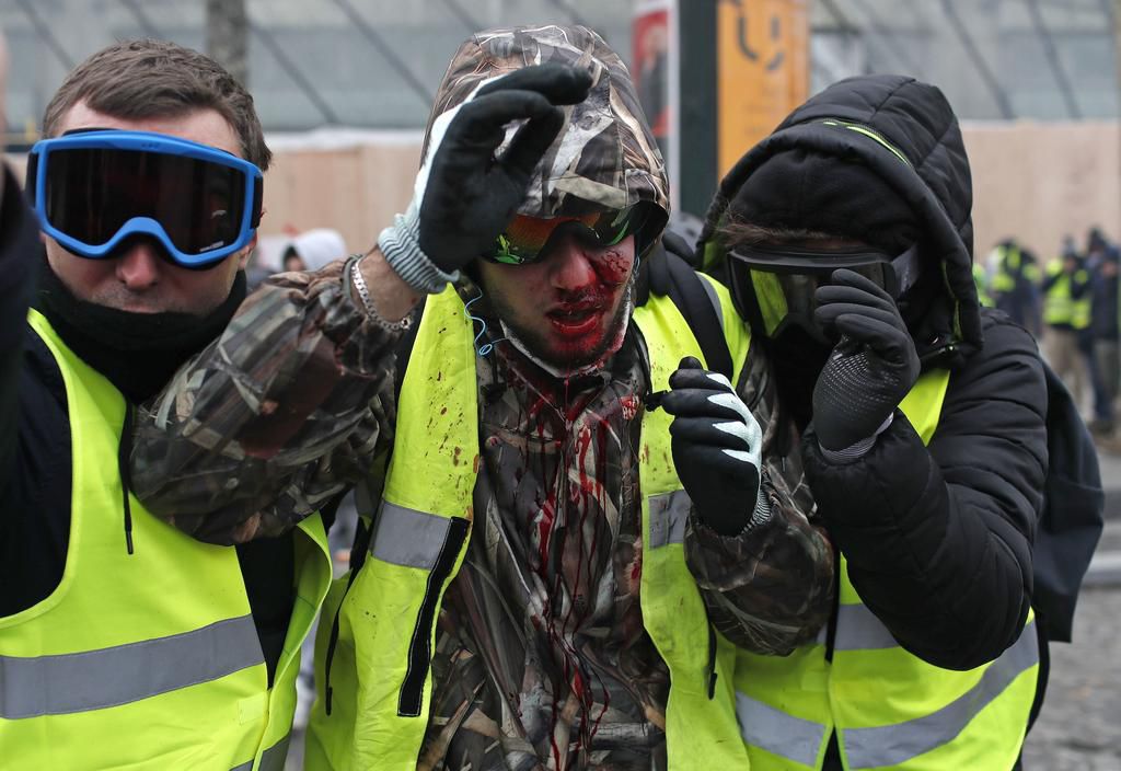 More than 1,300 were arrested and dozens injured after violent anti-government protests engulfed France — here's how the clashes unfolded