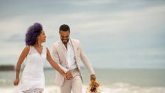 Black couple on their wedding day [iStock]