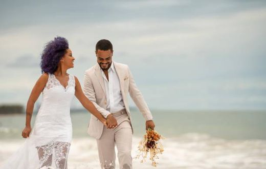 Black couple on their wedding day [iStock]