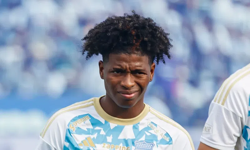 Terrified footballer hides under bed as wife and 5-year-old son are kidnapped
