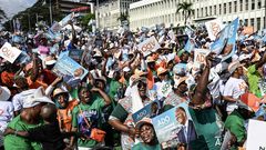 Supporters of Ivorian President Alassane Ouattara before his closing campaign rally in Abidjan.Photographer: Sia Kambou/AFP/Getty Images