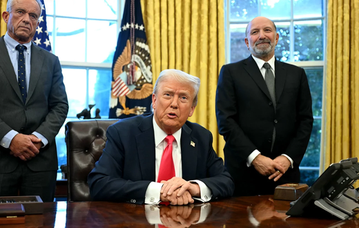 Donald Trump, US Secretary of Health and Human Services Robert F. Kennedy Jr. (L) and US Secretary of Commerce nominee Howard Lutnick (R), at the Oval Office of the White House in Washington, DC on February 25, 2025. Jim Watson/AFP/Getty Images