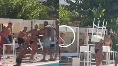 Footballer hits woman with chair into pool during heated fight (Video)