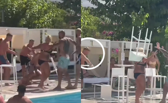 Footballer hits woman with chair into pool during heated fight (Video)