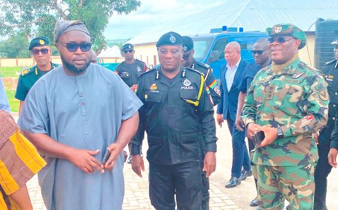 Salisu Be-Awuribe (left), Savannah Regional Minister, conducting COP Christian Tetteh Yohuno, IGP, and his team around. Credit: GraphicOnline