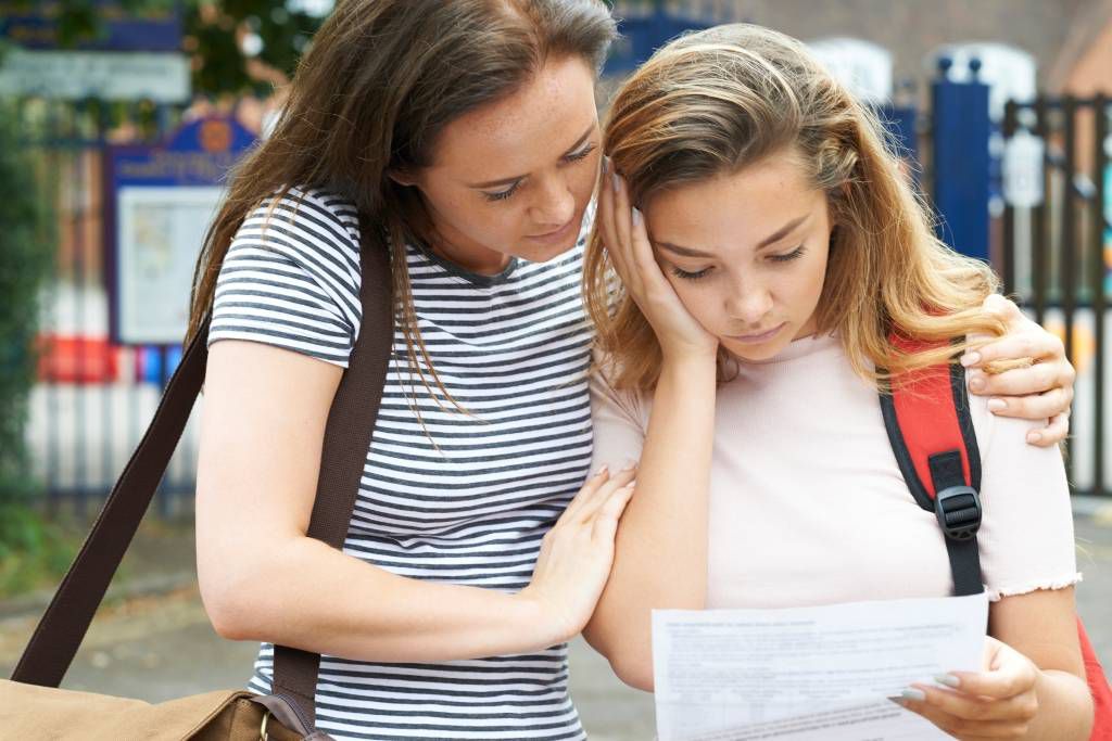girl-consoles-friend-poor-exam-results