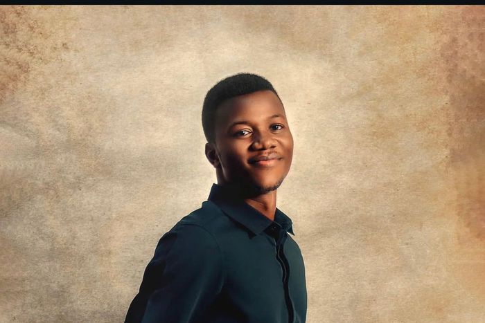 The photographer, Nicholas [Funke Adeoye / X]