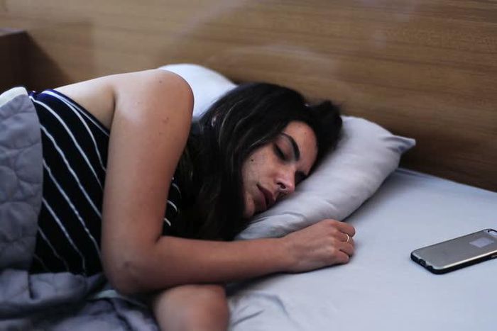 Here are 3 undeniable reasons to not sleep with your phone in bed [Credit: Shutterstock]