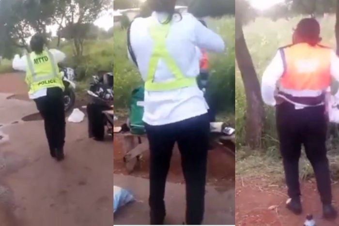 Police officers jam vigorously to political campaign song while at post