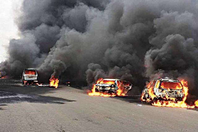An image shows the devastation from a petrol tanker explosion.