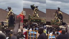 Traditional chief in palanquin jams to King Paluta's 'Makoma' hit song(video)