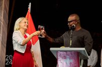 Ghana’s Minister of Roads and Highways, Francis Asenso-Boakye toasts with  Ambassador Simone Giger of Switzerland