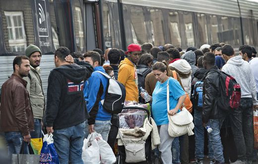 Sweden immigrants-The Christian Science Monitor